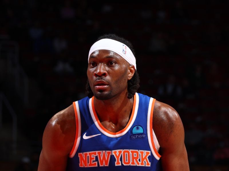 TORONTO, CANADA - MARCH 27: Precious Achiuwa #5 of the New York Knicks shoots a free throw during the game against the Toronto Raptors on March 27, 2024 at the Scotiabank Arena in Toronto, Ontario, Canada.  NOTE TO USER: User expressly acknowledges and agrees that, by downloading and or using this Photograph, user is consenting to the terms and conditions of the Getty Images License Agreement.  Mandatory Copyright Notice: Copyright 2024 NBAE (Photo by Vaughn Ridley/NBAE via Getty Images)