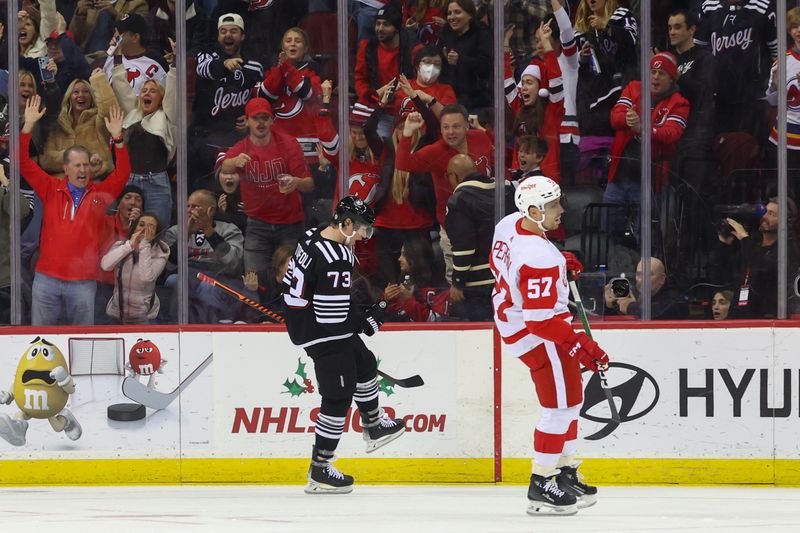 Dec 23, 2023; Newark, New Jersey, USA; New Jersey Devils right wing Tyler Toffoli (73) celebrates his goal against the Detroit Red Wings during the third period at Prudential Center. Mandatory Credit: Ed Mulholland-USA TODAY Sports