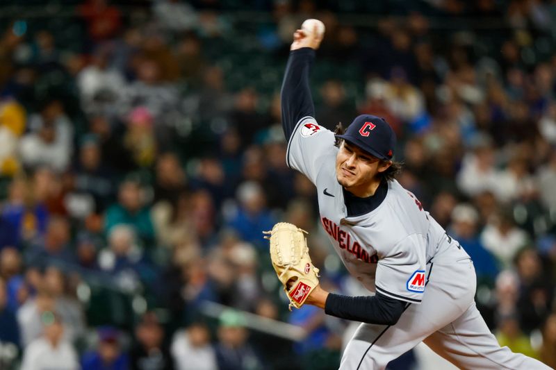 Apr 2, 2024; Seattle, Washington, USA; Cleveland Guardians relief pitcher Eli Morgan (49) throws against the Seattle Mariners during the seventh inning at T-Mobile Park. Mandatory Credit: Joe Nicholson-USA TODAY Sports