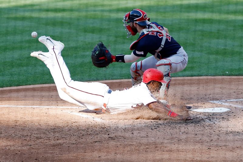 Aug 17, 2023; Washington, District of Columbia, USA; Washington Nationals second baseman Jeter Downs (3) scores a run ahead of a tag by Boston Red Sox catcher Connor Wong (12) on a two run double by Nationals designated hitter Joey Meneses (not pictured) during the fifth inning at Nationals Park. Mandatory Credit: Geoff Burke-USA TODAY Sports