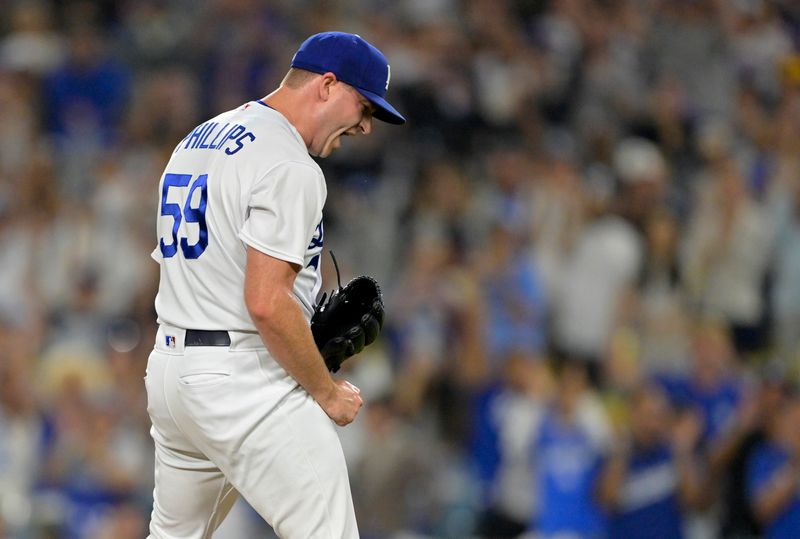 Aug 17, 2023; Los Angeles, California, USA;  Los Angeles Dodgers relief pitcher Evan Phillips (59) reacts after earning the save in the ninth inning against the Milwaukee Brewers at Dodger Stadium. Mandatory Credit: Jayne Kamin-Oncea-USA TODAY Sports