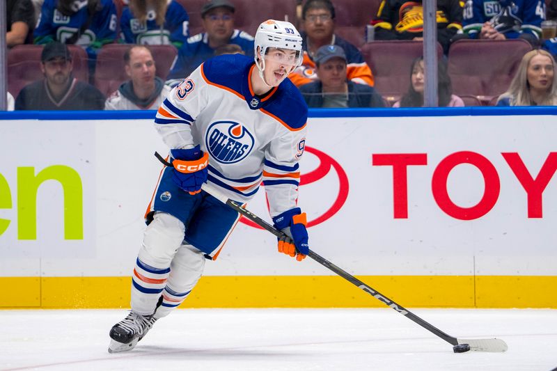 May 20, 2024; Vancouver, British Columbia, CAN; Edmonton Oilers forward Ryan Nugent Hopkins (93) handles the puck against the Vancouver Canucks during the second period in game seven of the second round of the 2024 Stanley Cup Playoffs at Rogers Arena. Mandatory Credit: Bob Frid-USA TODAY Sports