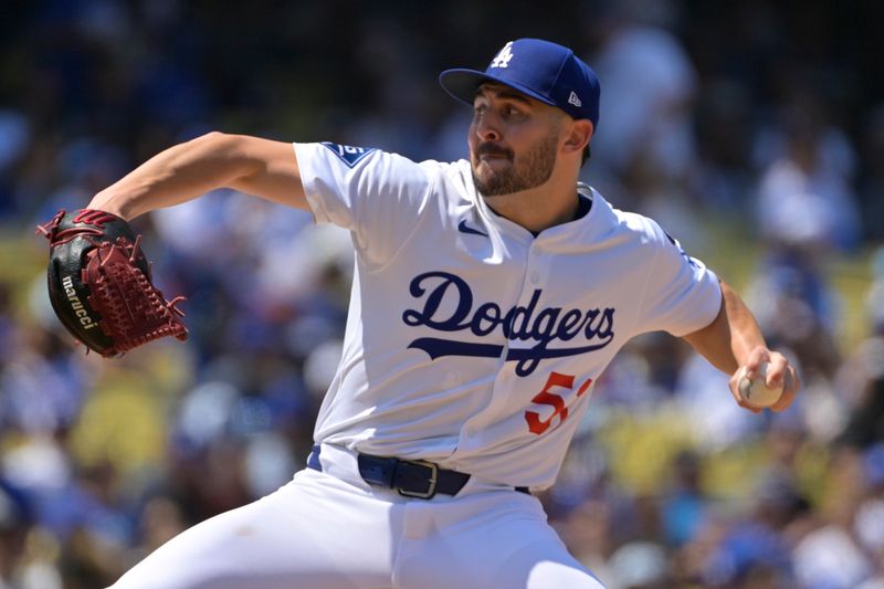 Apr 30, 2025; Los Angeles, California, USA;  Los Angeles Dodgers relief pitcher Alex Vesia (51) delivers to the plate in the seventh inning against the Miami Marlins at Dodger Stadium. Mandatory Credit: Jayne Kamin-Oncea-Imagn Images