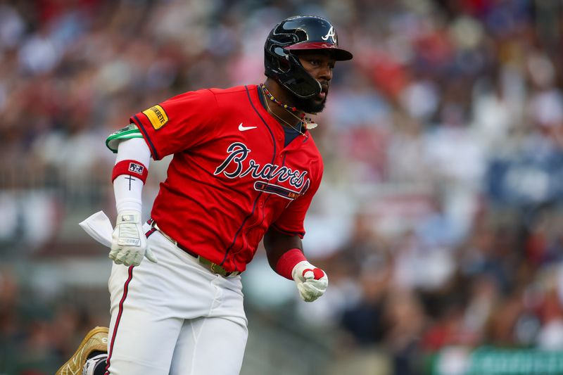 Jun 14, 2024; Atlanta, Georgia, USA; Atlanta Braves center fielder Michael Harris II (23) runs to first on a single against the Tampa Bay Rays in the first inning at Truist Park. Mandatory Credit: Brett Davis-USA TODAY Sports
