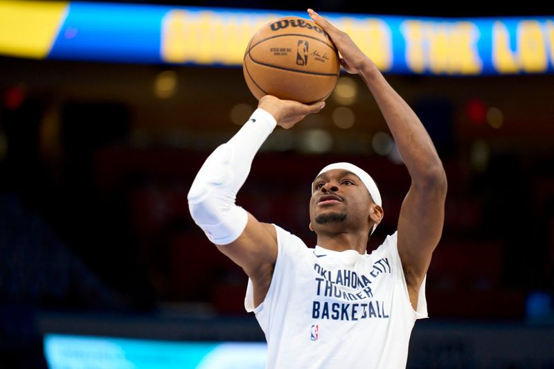 OKLAHOMA CITY, OKLAHOMA - APRIL 21: Shai Gilgeous-Alexander #2 of the Oklahoma City Thunder warms up before tipoff against the New Orleans Pelicans in game one of the Western Conference First Round Playoffs at the Paycom Center on April 21, 2024 in Oklahoma City, Oklahoma. NOTE TO USER: User expressly acknowledges and agrees that, by downloading and or using this photograph, User is consenting to the terms and conditions of the Getty Images License Agreement.  (Photo by Cooper Neill/Getty Images)