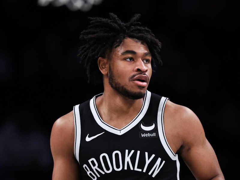 NEW YORK, NEW YORK - JANUARY 23: Cam Thomas #24 of the Brooklyn Nets brings the ball up the court during the first quarter of the game against the New York Knicks at Barclays Center on January 23, 2024 in the Brooklyn borough of New York City.  NOTE TO USER: User expressly acknowledges and agrees that, by downloading and or using this photograph, User is consenting to the terms and conditions of the Getty Images License Agreement. (Photo by Dustin Satloff/Getty Images)