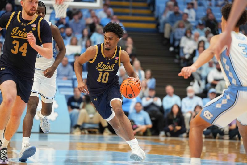 Jan 21, 2026; Chapel Hill, North Carolina, USA; Notre Dame Fighting Irish forward Jalen Haralson (10) dribbles in the first half at Dean E. Smith Center. Mandatory Credit: Bob Donnan-Imagn Images