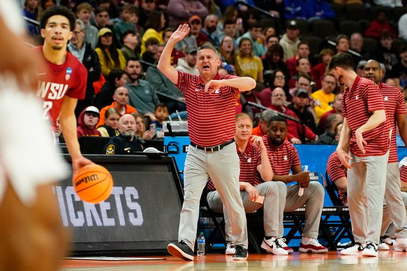 Mar 23, 2024; Omaha, NE, USA; Washington State Cougars head coach Kyle Smith reacts during the first half against the Iowa State Cyclones in the second round of the 2024 NCAA Tournament at CHI Health Center Omaha. Mandatory Credit: Dylan Widger-USA TODAY Sports