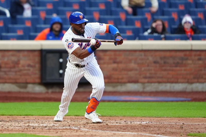 Apr 4, 2024; New York City, New York, USA; New York Mets right fielder Starling Marte (6) lays down a sacrifice bunt against the Detroit Tigers during the ninth inning at Citi Field. Mandatory Credit: Gregory Fisher-USA TODAY Sports