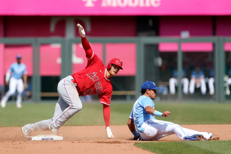 Jun 17, 2023; Kansas City, Missouri, USA; Los Angeles Angels designated hitter Shohei Ohtani (17) reacts to being tagged out by Kansas City Royals second baseman Nicky Lopez (8) during the fourth inning at Kauffman Stadium. Mandatory Credit: Scott Sewell-USA TODAY Sports