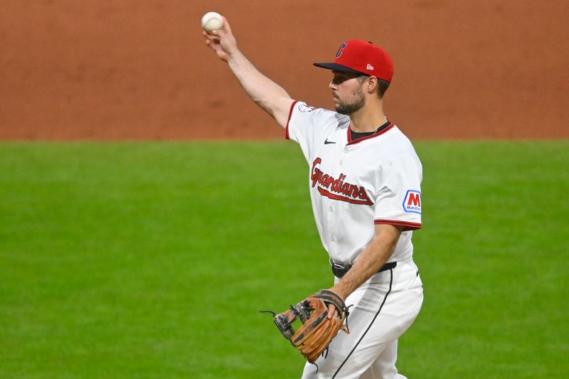 Apr 28, 2025; Cleveland, Ohio, USA; Cleveland Guardians infielder Will Wilson (7) pitches n the eighth inning against the Minnesota Twins at Progressive Field. Mandatory Credit: David Richard-Imagn Images
