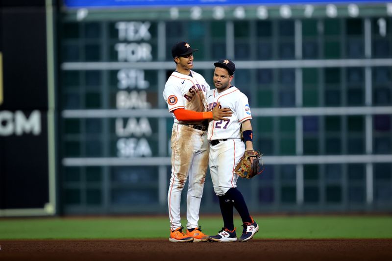 Sep 13, 2023; Houston, Texas, USA; Houston Astros shortstop Jeremy Pena (3) and Houston Astros second baseman Jose Altuve (27) congratulate each other after the final out against the Oakland Athletics during the ninth inning at Minute Maid Park. Mandatory Credit: Erik Williams-USA TODAY Sports