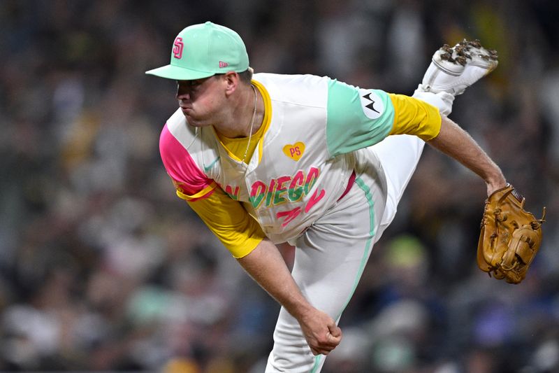 Jun 21, 2024; San Diego, California, USA; San Diego Padres relief pitcher Stephen Kolek (32) pitches against the Milwaukee Brewers during the eighth inning at Petco Park. Mandatory Credit: Orlando Ramirez-USA TODAY Sports