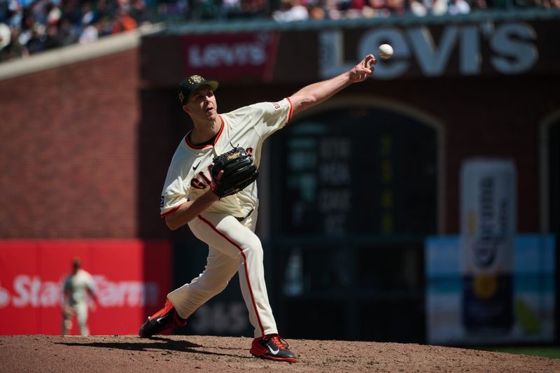 May 19, 2024; San Francisco, California, USA; San Francisco Giants pitcher Taylor Rogers (33) throws a pitch against the Colorado Rockies during the seventh inning at Oracle Park. Mandatory Credit: Robert Edwards-USA TODAY Sports