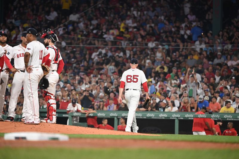 Jul 30, 2024; Boston, Massachusetts, USA; Boston Red Sox starting pitcher James Paxton (65) is relieved of pitching duties during the fifth inning against the Seattle Mariners   at Fenway Park. Mandatory Credit: Eric Canha-USA TODAY Sports