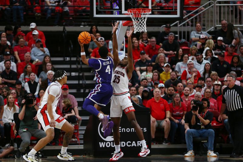 Feb 20, 2024; Lubbock, Texas, USA;  TCU Horned Frogs guard Jameer Nelson Jr. (4) shoots over Texas Tech Red Raiders forward Robert Jennings (25) in the first half at United Supermarkets Arena. Mandatory Credit: Michael C. Johnson-USA TODAY Sports