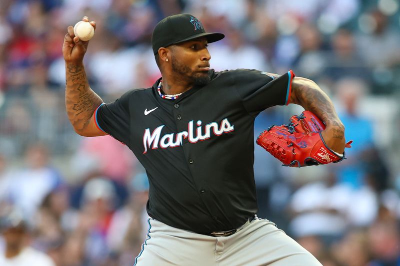 Apr 24, 2024; Atlanta, Georgia, USA; Miami Marlins starting pitcher Sixto Sanchez (18) throws against the Atlanta Braves in the first inning at Truist Park. Mandatory Credit: Brett Davis-USA TODAY Sports