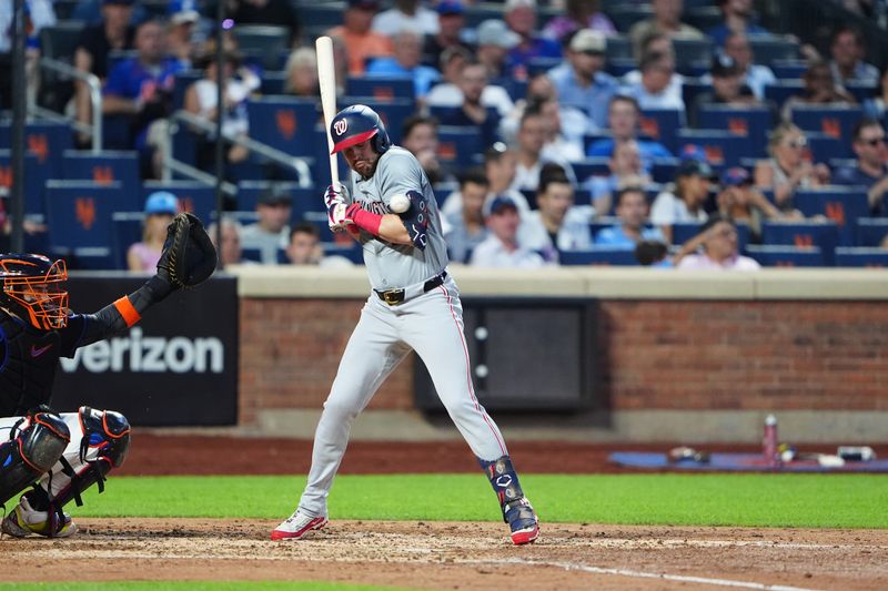 Jul 10, 2024; New York City, New York, USA; Washington Nationals right fielder Lane Thomas (28) is hit by a pitch during the sixth inning at Citi Field. Mandatory Credit: Gregory Fisher-USA TODAY Sports