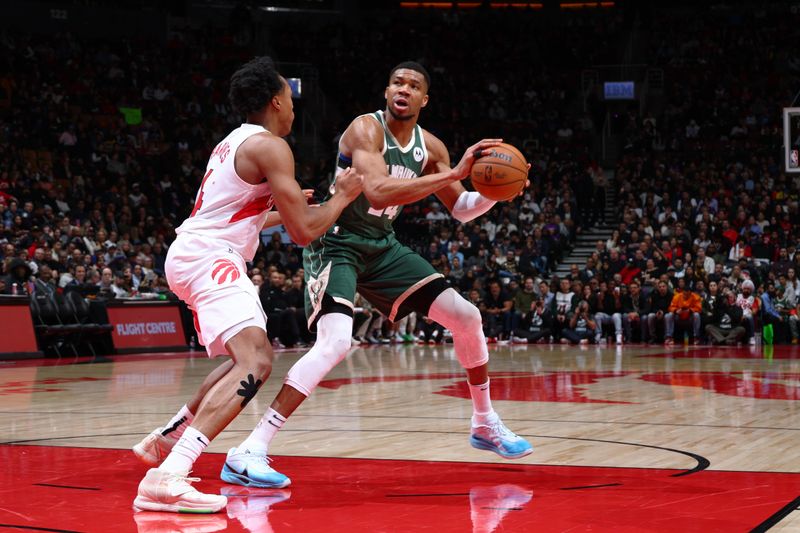 TORONTO, CANADA - JANUARY 6: Giannis Antetokounmpo #34 of the Milwaukee Bucks prepares to shoot the ball during the game against the Toronto Raptors on January 6, 2025 at the Scotiabank Arena in Toronto, Ontario, Canada.  NOTE TO USER: User expressly acknowledges and agrees that, by downloading and or using this Photograph, user is consenting to the terms and conditions of the Getty Images License Agreement.  Mandatory Copyright Notice: Copyright 2025 NBAE (Photo by Vaughn Ridley/NBAE via Getty Images)