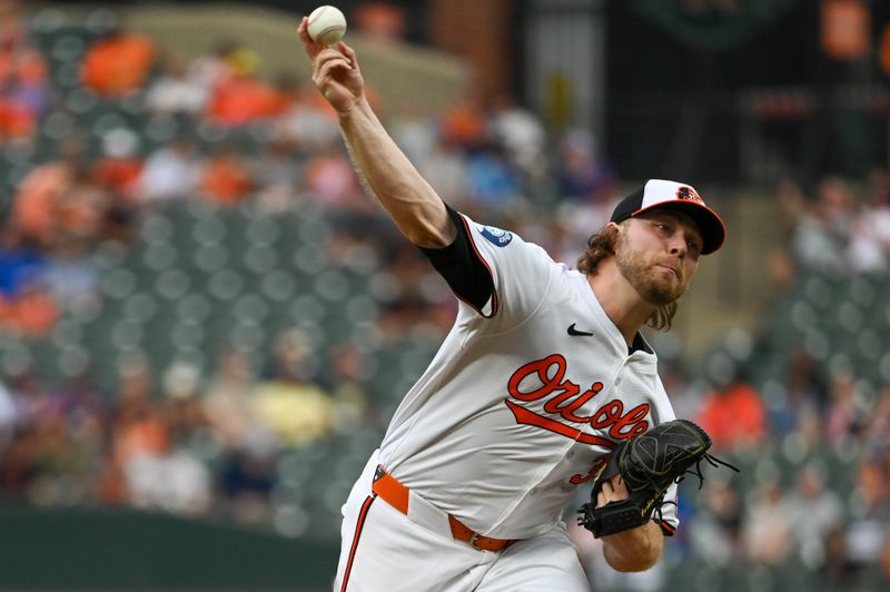 Jul 30, 2024; Baltimore, Maryland, USA;  Baltimore Orioles pitcher Corbin Burnes (39) delivers a first inning pitch against the Toronto Blue Jays at Oriole Park at Camden Yards. Mandatory Credit: Tommy Gilligan-USA TODAY Sports