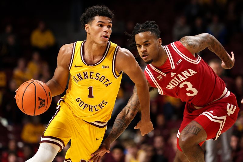 Dec 3, 2025; Minneapolis, Minnesota, USA; Minnesota Golden Gophers guard Isaac Asuma (1) works around Indiana Hoosiers guard Lamar Wilkerson (3) during the first half at Williams Arena. Mandatory Credit: Matt Krohn-Imagn Images