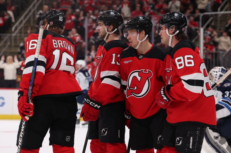 Jan 27, 2026; Newark, New Jersey, USA; New Jersey Devils left wing Jesper Bratt (63) celebrates his goal against the Winnipeg Jets during the second period at Prudential Center. Mandatory Credit: Ed Mulholland-Imagn Images