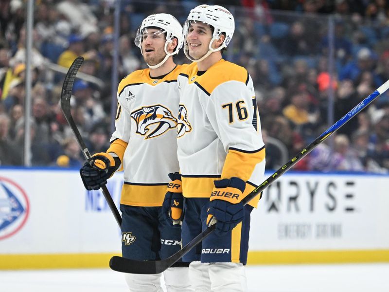 Jan 31, 2025; Buffalo, New York, USA; Nashville Predators defenseman Brady Skjei (76) celebrates scoring a goal against the Buffalo Sabres with Nashville Predators center Colton Sissons (10) in the first period at the KeyBank Center. Mandatory Credit: Mark Konezny-Imagn Images