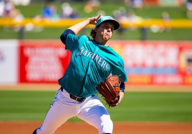 Mar 5, 2024; Peoria, Arizona, USA; Seattle Mariners pitcher Logan Gilbert against the Texas Rangers during a spring training baseball game at Peoria Sports Complex. Mandatory Credit: Mark J. Rebilas-USA TODAY Sports