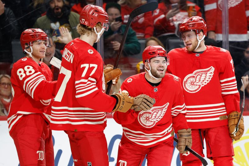 Dec 2, 2025; Detroit, Michigan, USA;  Detroit Red Wings right wing Alex Debrincat (93) receives congratulations from teammates after scoring in the second period against the Boston Bruins at Little Caesars Arena. Mandatory Credit: Rick Osentoski-Imagn Images
