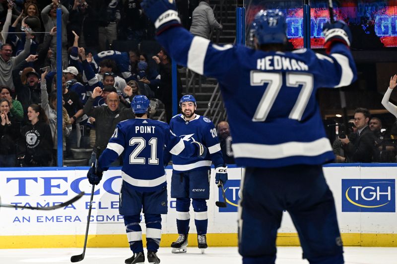 Dec 21, 2023; Tampa, Florida, USA; Tampa Bay Lightning left wing Nicholas Paul (20) celebrates after scoring the game winning goal in the third period again the Las Vegas Golden Knights at Amalie Arena. Mandatory Credit: Jonathan Dyer-USA TODAY Sports