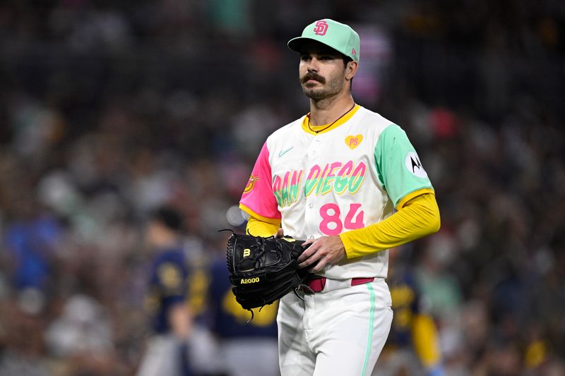 Jun 21, 2024; San Diego, California, USA; San Diego Padres starting pitcher Dylan Cease (84) walks to the dugout after a pitching change during the fifth inning against the Milwaukee Brewers at Petco Park. Mandatory Credit: Orlando Ramirez-USA TODAY Sports