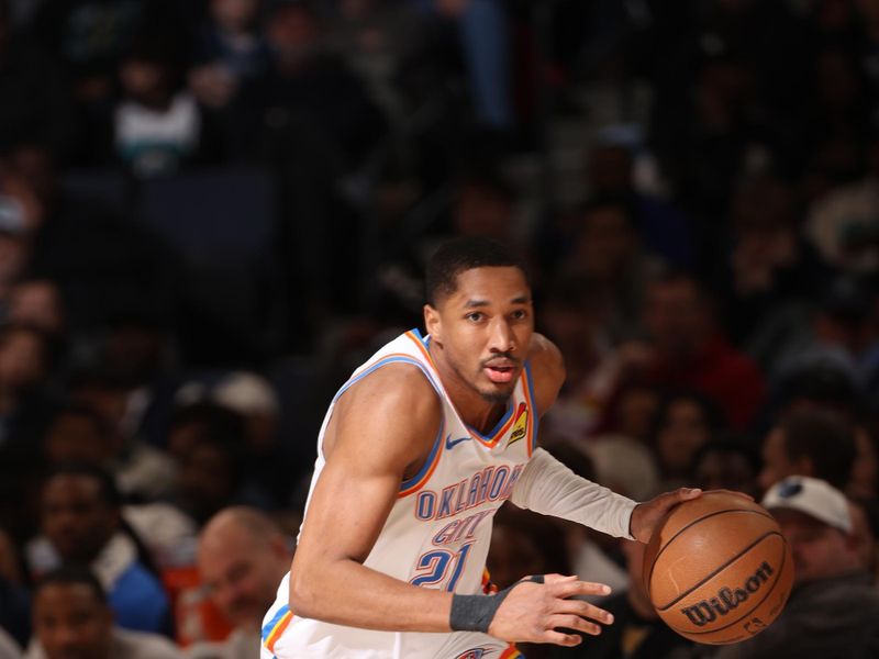 MEMPHIS, TN - MARCH 5:  Aaron Wiggins #21 of the Oklahoma City Thunder handles the ball during the game against the Memphis Grizzlies on March 5, 2025 at FedExForum in Memphis, Tennessee. NOTE TO USER: User expressly acknowledges and agrees that, by downloading and or using this photograph, User is consenting to the terms and conditions of the Getty Images License Agreement. Mandatory Copyright Notice: Copyright 2025 NBAE (Photo by Joe Murphy/NBAE via Getty Images)