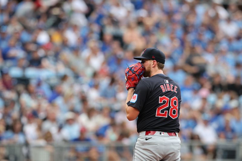 Jun 28, 2023; Kansas City, Missouri, USA; Cleveland Guardians pitcher Tanner Bibee (28) looks for the sign during the first inning against the Kansas City Royals at Kauffman Stadium. Mandatory Credit: William Purnell-USA TODAY Sports