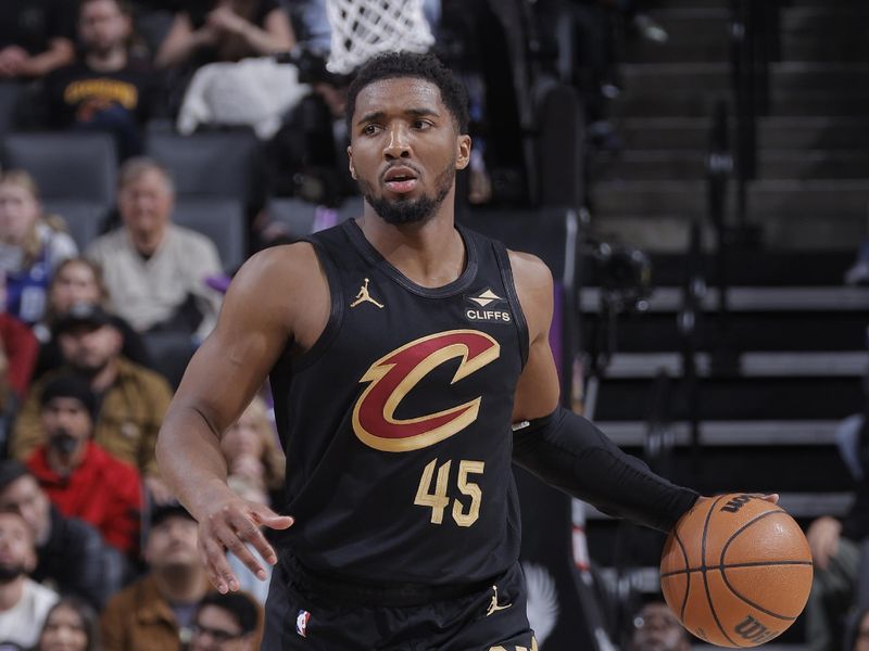 SACRAMENTO, CA - MARCH 19:  Donovan Mitchell #45 of the Cleveland Cavaliers dribbles the ball during the game against the Sacramento Kings on March 19, 2025 at Golden 1 Center in Sacramento, California. NOTE TO USER: User expressly acknowledges and agrees that, by downloading and or using this Photograph, user is consenting to the terms and conditions of the Getty Images License Agreement. Mandatory Copyright Notice: Copyright 2025 NBAE (Photo by Rocky Widner/NBAE via Getty Images)