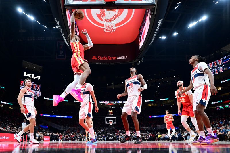 ATLANTA, GA - OCTOBER 28:  Jalen Johnson #1 of the Atlanta Hawks drives to the basket during the game on October 28, 2024 at State Farm Arena in Atlanta, Georgia.  NOTE TO USER: User expressly acknowledges and agrees that, by downloading and/or using this Photograph, user is consenting to the terms and conditions of the Getty Images License Agreement. Mandatory Copyright Notice: Copyright 2024 NBAE (Photo by Adam Hagy/NBAE via Getty Images)