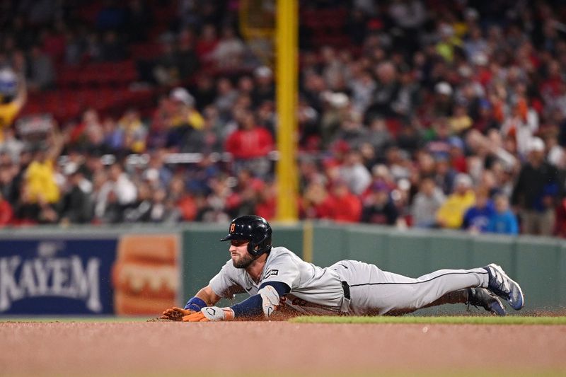 May 30, 2024; Boston, Massachusetts, USA; Detroit Tigers right field Matt Vierling (8) slides into second base during the eighth inning against the Boston Red Sox at Fenway Park. Mandatory Credit: Eric Canha-USA TODAY Sports