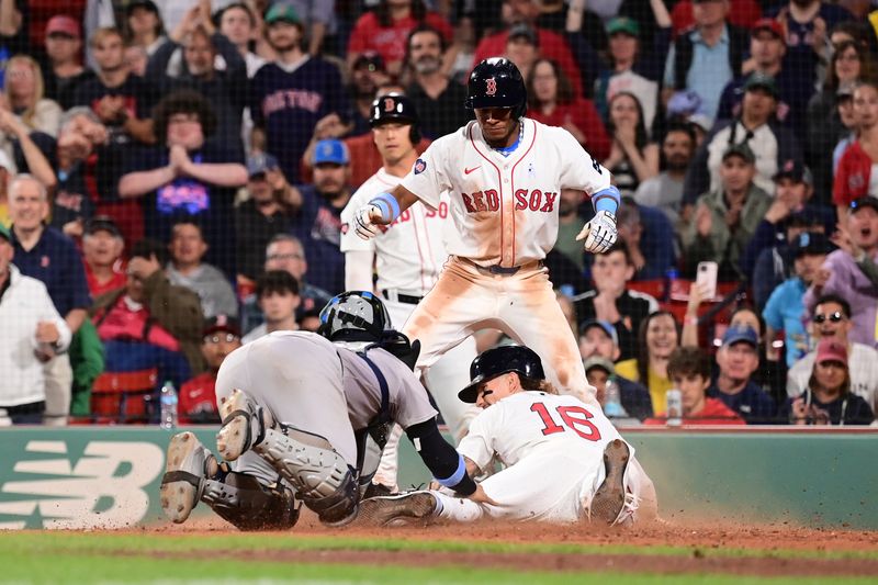 Jun 16, 2024; Boston, Massachusetts, USA; Boston Red Sox left fielder Jarren Duran (16) is tagged out by New York Yankees catcher Jose Trevino (39) during the eighth inning at Fenway Park. Mandatory Credit: Eric Canha-USA TODAY Sports