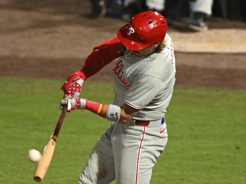 May 8, 2025; St. Petersburg, Florida, USA; Philadelphia Phillies second baseman Bryson Stott (5) hits a three run home run in the eighth inning against the Tampa Bay Rays at George M. Steinbrenner Field. Mandatory Credit: Jonathan Dyer-Imagn Images