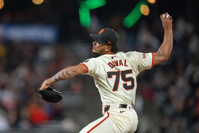 Apr 22, 2024; San Francisco, California, USA;  San Francisco Giants pitcher Camilo Doval (75) delivers a pitch against the New York Mets during the ninth inning at Oracle Park. Mandatory Credit: Neville E. Guard-USA TODAY Sports