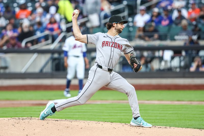 May 30, 2024; New York City, New York, USA; Arizona Diamondbacks starting pitcher Zac Gallen (23) pitches in the first inning against the New York Mets at Citi Field. Mandatory Credit: Wendell Cruz-USA TODAY Sports