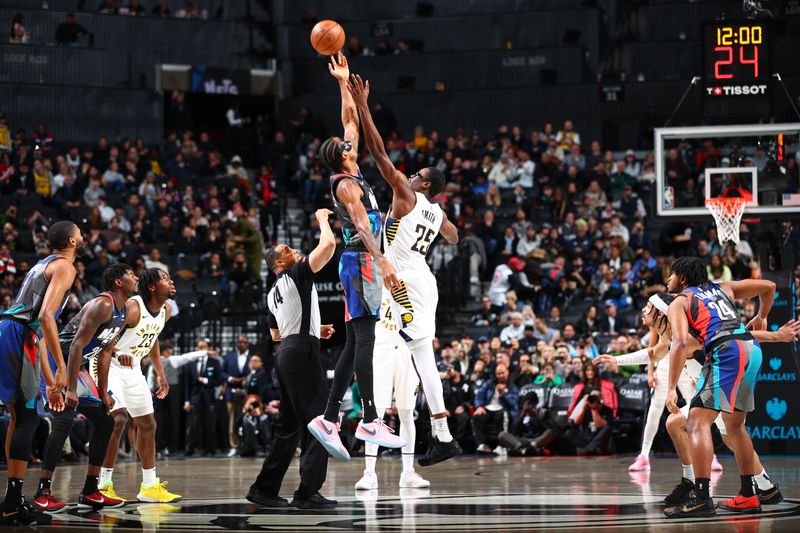 BROOKLYN, NY - APRIL 3: Nicolas Claxton #33 of the Brooklyn Nets goes up for the tipoff during the game against the Indiana Pacers on April 3, 2024 at Barclays Center in Brooklyn, New York. NOTE TO USER: User expressly acknowledges and agrees that, by downloading and or using this Photograph, user is consenting to the terms and conditions of the Getty Images License Agreement. Mandatory Copyright Notice: Copyright 2024 NBAE (Photo by David L. Nemec/NBAE via Getty Images)