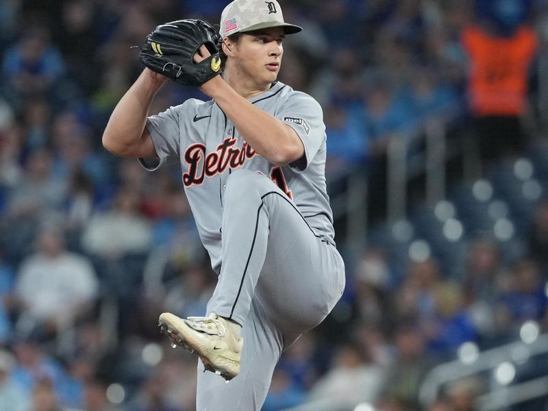 May 18, 2025; Toronto, Ontario, CAN; Detroit Tigers starting pitcher Jackson Jobe (21) throws pitch against the Toronto Blue Jays during the first inning at Rogers Centre. Mandatory Credit: Nick Turchiaro-Imagn Images
