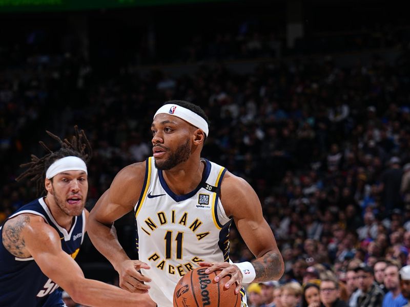 DENVER, CO - JANUARY 14: Bruce Brown #11 of the Indiana Pacers handles the ball during the game against the Denver Nuggets on January 14, 2024 at the Ball Arena in Denver, Colorado. NOTE TO USER: User expressly acknowledges and agrees that, by downloading and/or using this Photograph, user is consenting to the terms and conditions of the Getty Images License Agreement. Mandatory Copyright Notice: Copyright 2024 NBAE (Photo by Garrett Ellwood/NBAE via Getty Images)