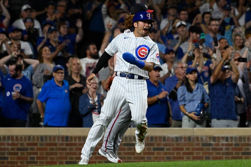 Jul 19, 2023; Chicago, Illinois, USA;  Chicago Cubs right fielder Seiya Suzuki (27) yells while scoring against the Washington Nationals during the eighth inning at Wrigley Field. Mandatory Credit: Matt Marton-USA TODAY Sports