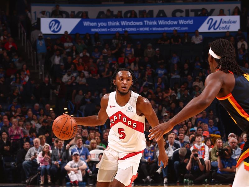 OKLAHOMA CITY, OK - FEBRUARY 4:  Immanuel Quickley #5 of the Toronto Raptors goes to the basket during the game on February 4, 2024 at Paycom Arena in Oklahoma City, Oklahoma. NOTE TO USER: User expressly acknowledges and agrees that, by downloading and or using this photograph, User is consenting to the terms and conditions of the Getty Images License Agreement. Mandatory Copyright Notice: Copyright 2024 NBAE (Photo by Zach Beeker/NBAE via Getty Images)