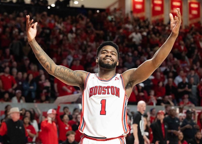 Jan 28, 2023; Houston, Texas, USA; Houston Cougars guard Jamal Shead (1) celebrates the win against the Cincinnati Bearcats at Fertitta Center. Houston Cougars won 75 to 69 .Mandatory Credit: Thomas Shea-USA TODAY Sports