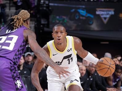 SACRAMENTO, CA - DECEMBER 16: Kris Dunn #11 of the Utah Jazz dribbles the ball during the game against the Sacramento Kings on December 16, 2023 at Golden 1 Center in Sacramento, California. NOTE TO USER: User expressly acknowledges and agrees that, by downloading and or using this Photograph, user is consenting to the terms and conditions of the Getty Images License Agreement. Mandatory Copyright Notice: Copyright 2023 NBAE (Photo by Rocky Widner/NBAE via Getty Images)