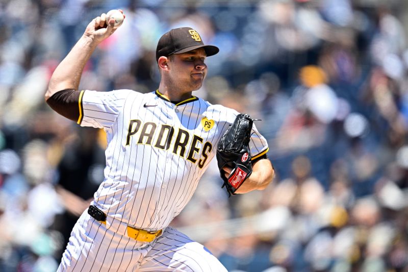 Jun 12, 2024; San Diego, California, USA; San Diego Padres starting pitcher Michael King (34) pitches against the Oakland Athletics during the first inning at Petco Park. Mandatory Credit: Orlando Ramirez-USA TODAY Sports