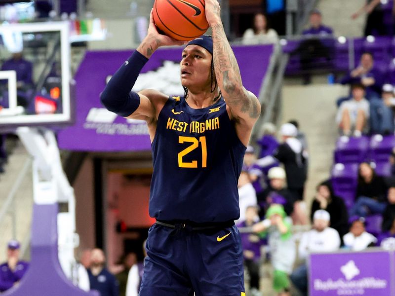 Feb 12, 2024; Fort Worth, Texas, USA;  West Virginia Mountaineers guard RaeQuan Battle (21) shoots during the second half against the TCU Horned Frogs at Ed and Rae Schollmaier Arena. Mandatory Credit: Kevin Jairaj-USA TODAY Sports