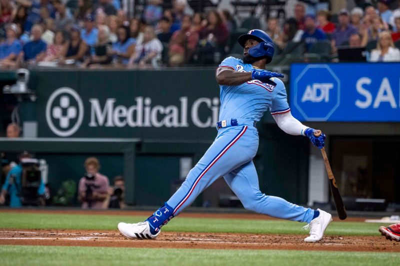 Sep 3, 2023; Arlington, Texas, USA; Texas Rangers right fielder Adolis Garcia (53) bats against the Minnesota Twins during the third inning at Globe Life Field. Mandatory Credit: Jerome Miron-USA TODAY Sports